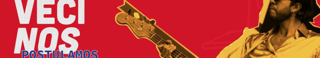 Persona con barba tocando guitarra