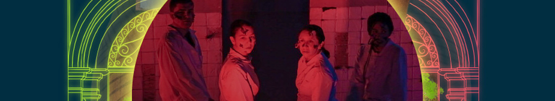 cuatro personas vestidas de blanco